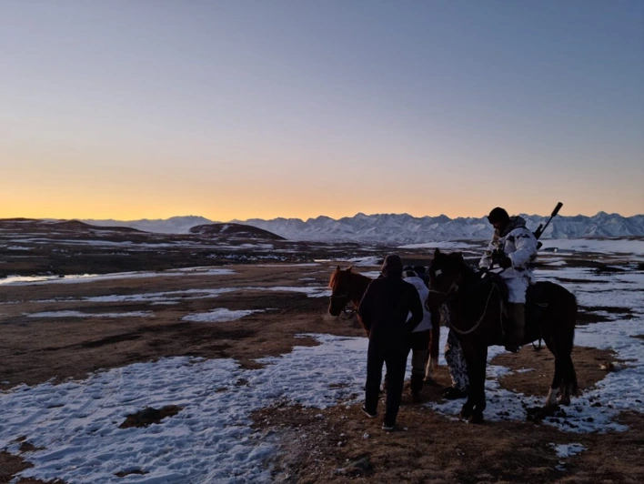 Riding horses while ibex and Marco Polo sheep hunting in Kyrgyzstan